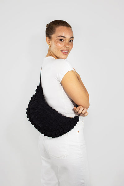 Kind Bag Black Recycled Fabric Crossbody on model 