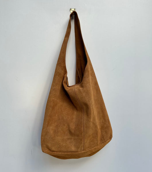 Camel Suede Slouchy Tote worn by Cathy