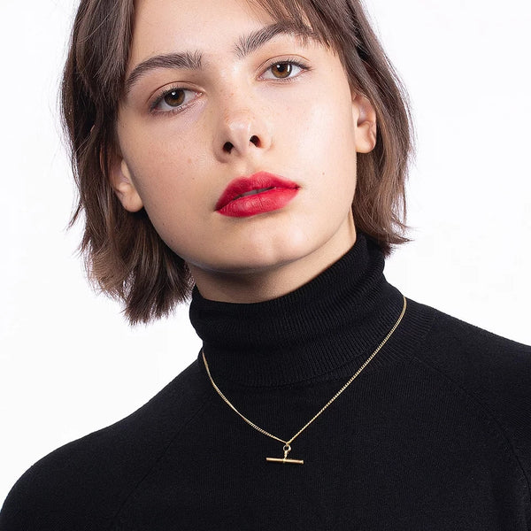 Gold T-Bar Waterproof Necklace from MisGraceful worn on a model