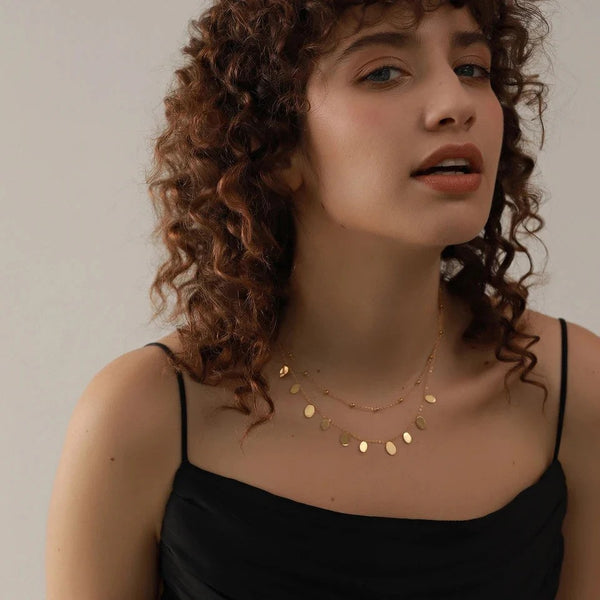 Gold Disc Double Layered tarnish proof necklace from MisGraceful Jewellery. Shown on a model.