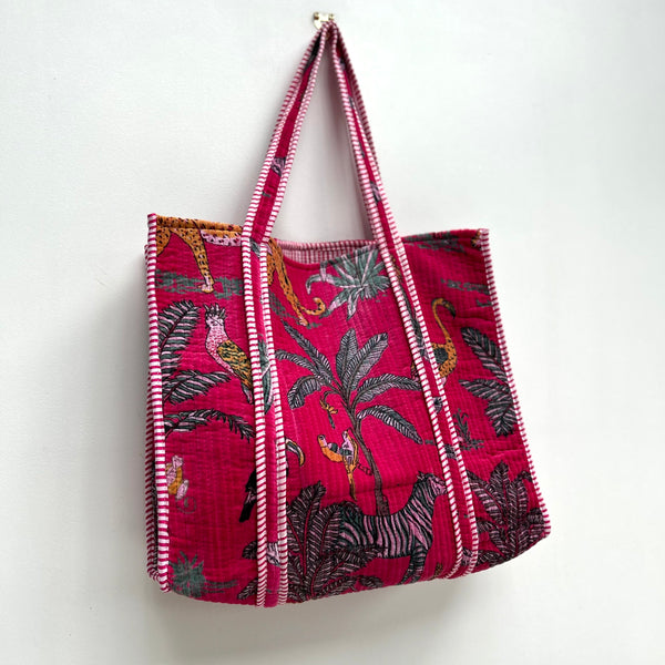 Pink jungle print velvet large tote bag hanging up